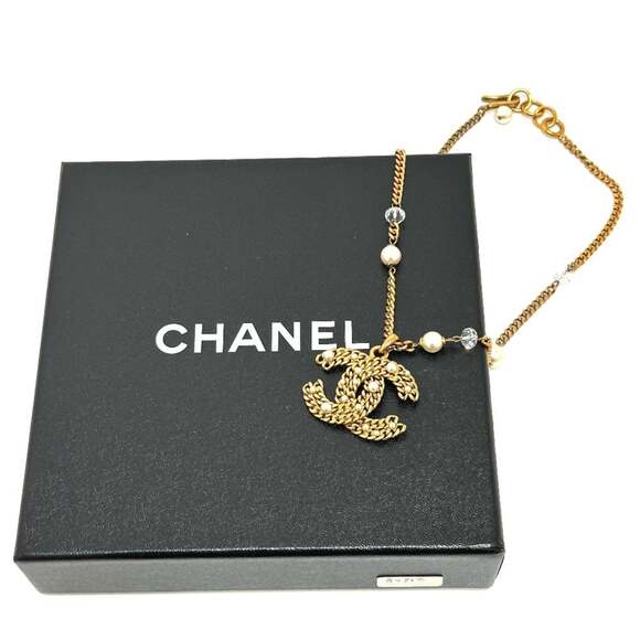 CHANEL Gold Pearl Logo Necklace - Picture 9 of 9